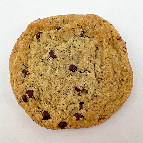Single vegan chocolate chip cookie shown from above.